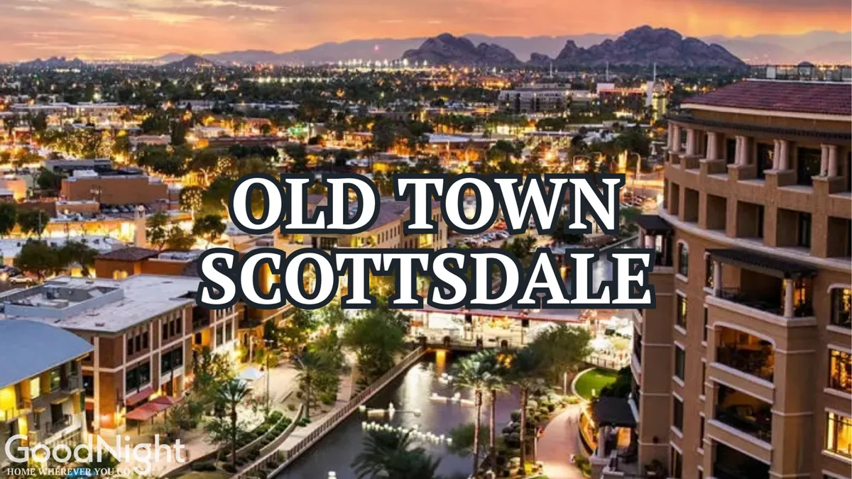 A scenic cityscape with sparkling city lights, palm trees, a mountain backdrop, and a lively waterway, suggesting vibrant downtown nightlife and local attractions within easy reach.